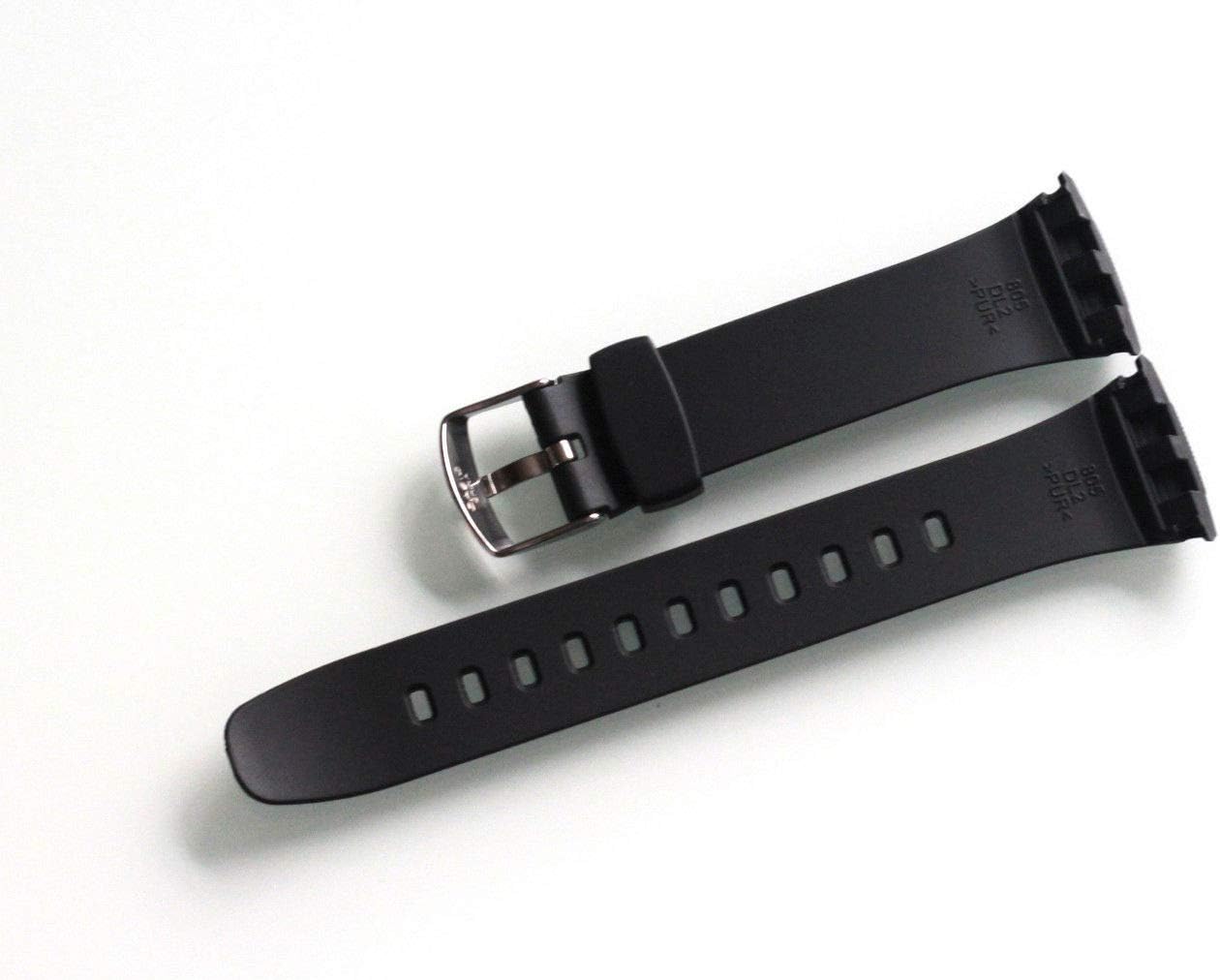 Close-up view tat-truf tat-twaħħil taċ-ċinga sewda ta' sostituzzjoni tal-arloġġ Casio, li turi l-plastik iffurmat u s-slots għall-vireg tar-rebbiegħa.