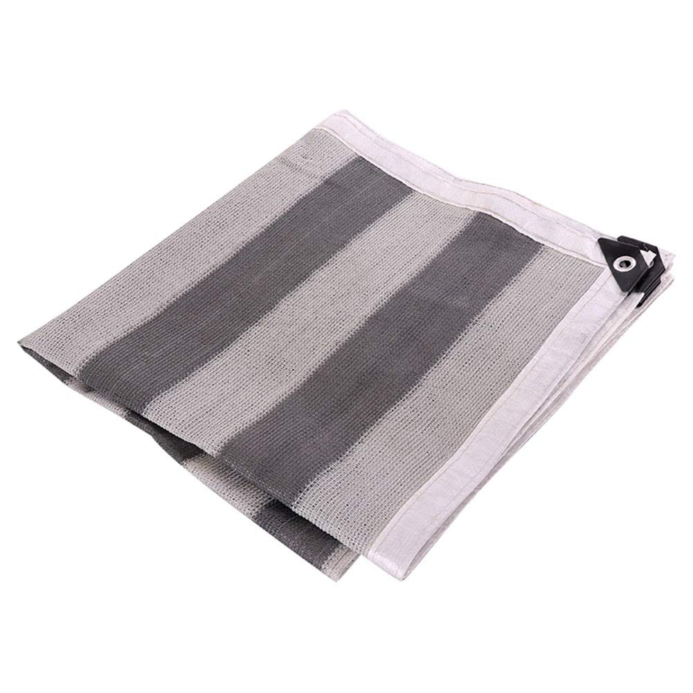 Voile ombrage style rayé pour créer un coin de fraîcheur sur la terrasse