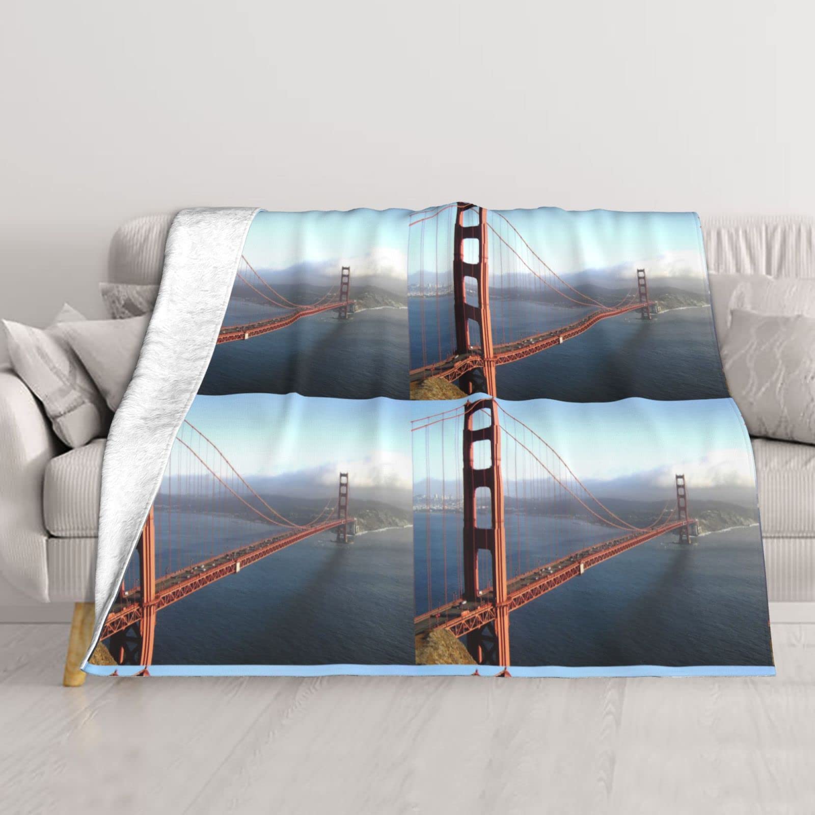 Couverture thermique respirante Golden Gate pour soirées canapé et nuits fraîches