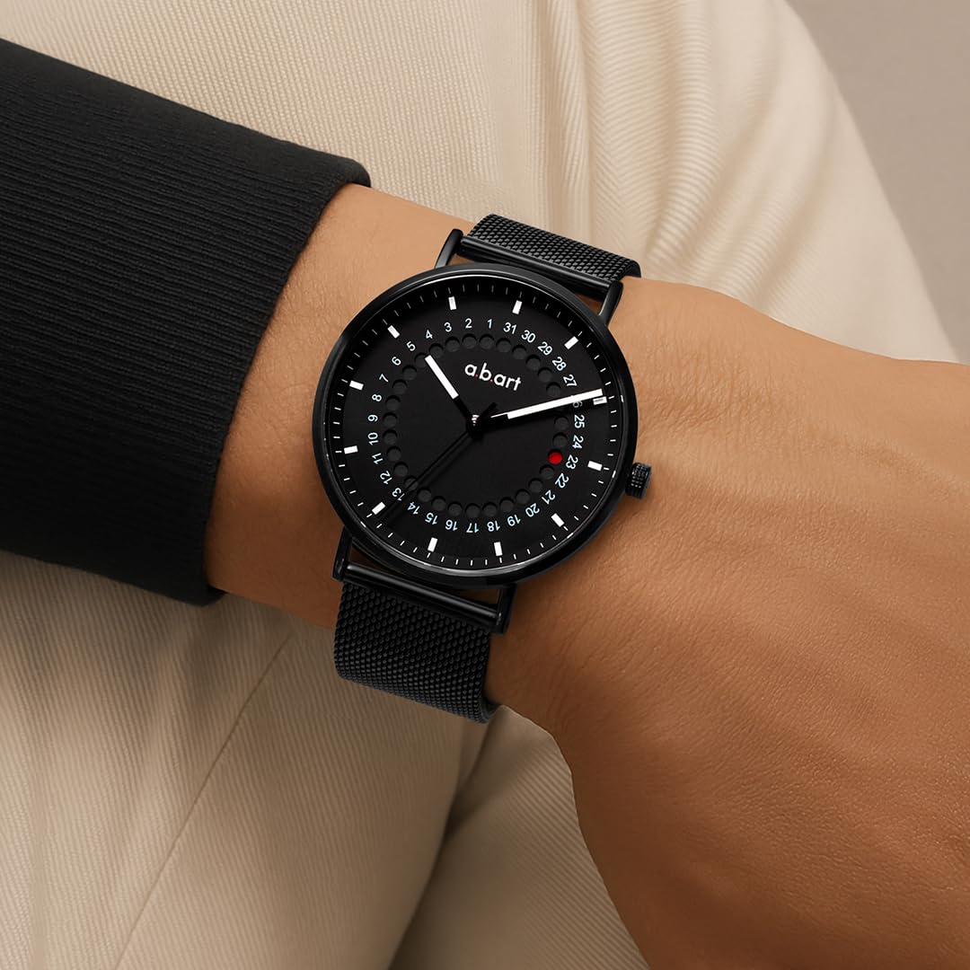 a.b.art Herren Uhr mit Punkt-Sprungdatumsanzeige – Schweizer Ronda-Quarzwerk, minimalistisches Bauhaus-Stil, Saphirglas, schwarzes Milanaise-Armband, 41 mm