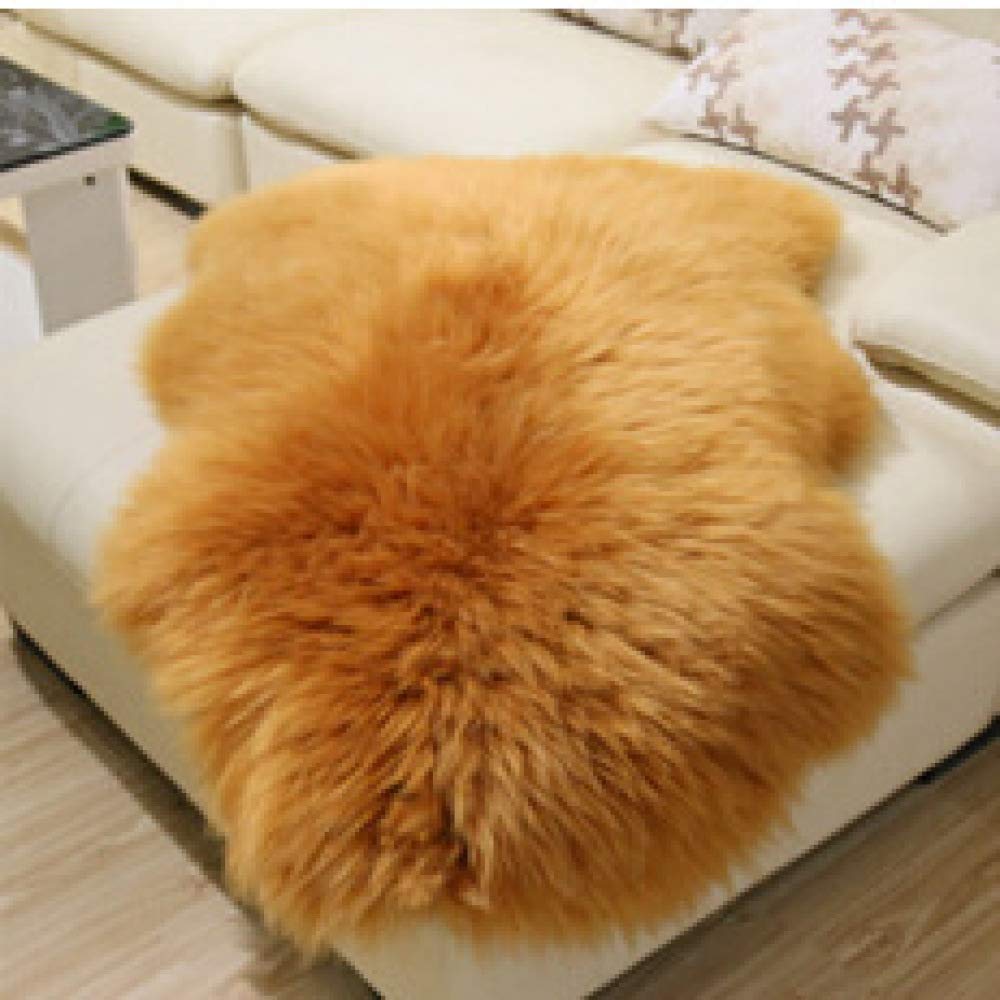 Tapis en peau de mouton contre le sol froid : isolez votre salon avec style