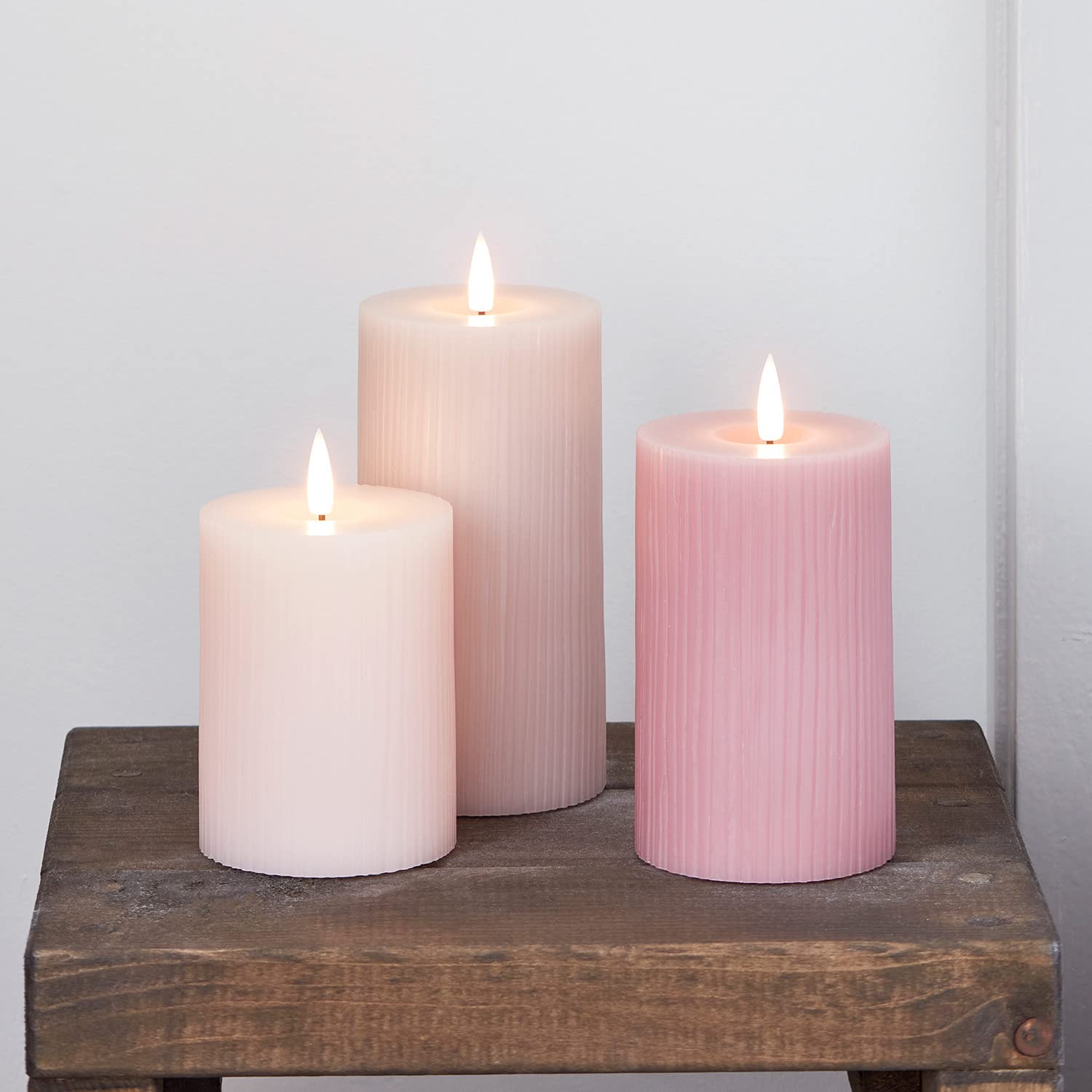 Lights4fun Set of 3 TruGlow® Pink Blush Ribbed Battery Operated LED Flameless Pillar Candles Real Wax with Timer