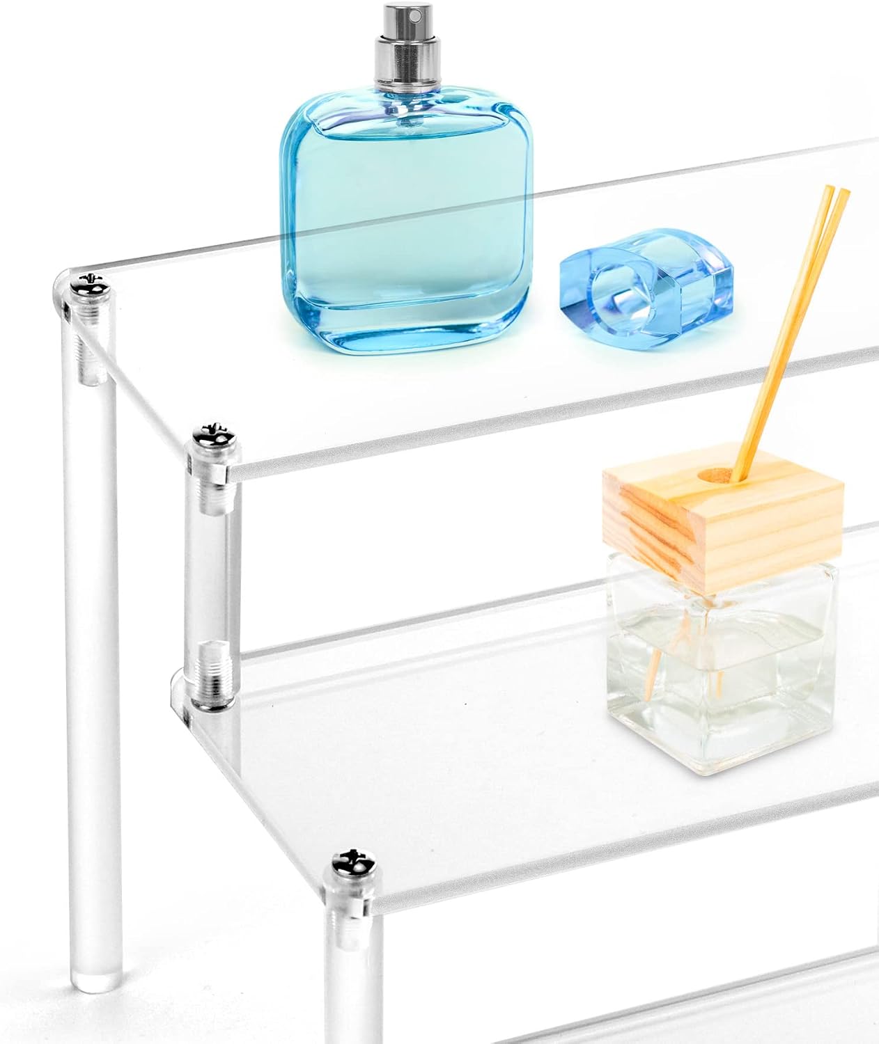 QWORK Acrylic Display Stand showcasing perfumes and diffusers