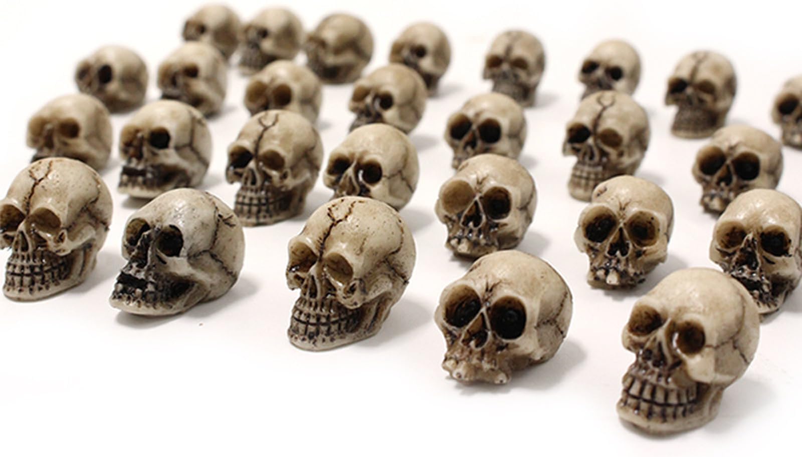 BinaryABC Mini Skull Figurine Miniature Skeleton Head Table Decor,Halloween Micro Landscape Figure,Halloween Prank Props,Haunted Dollhouse Accessories,20PCS