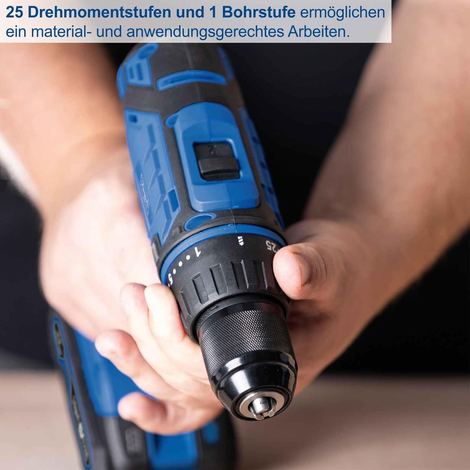 Close-up of a hand adjusting the torque collar on the Scheppach cordless drill, showing the 25 torque settings and drilling mode.