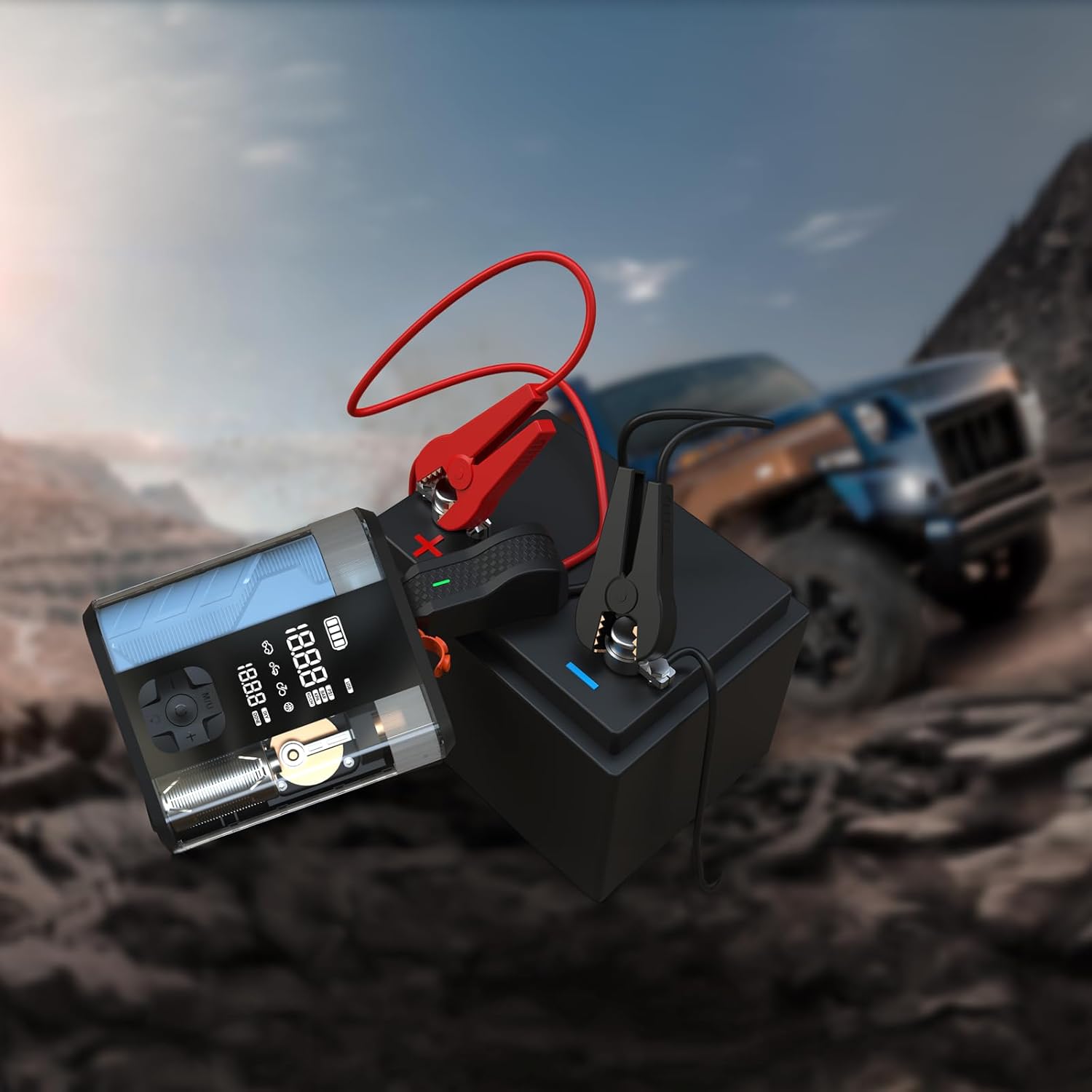 Powerology unit connected to a car battery for jump starting.