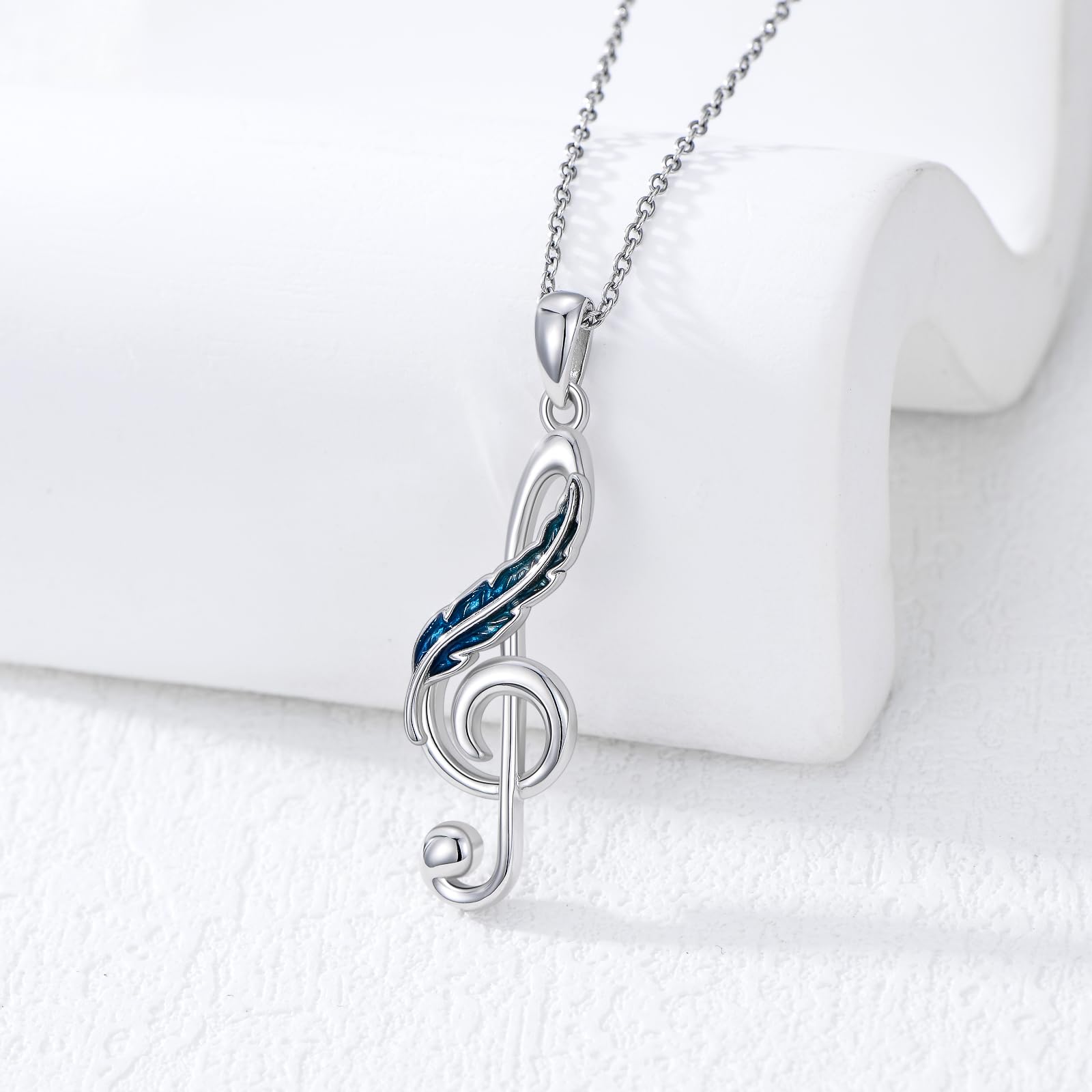 Collana con note musicali in argento Sterling con piuma e chiave di violino