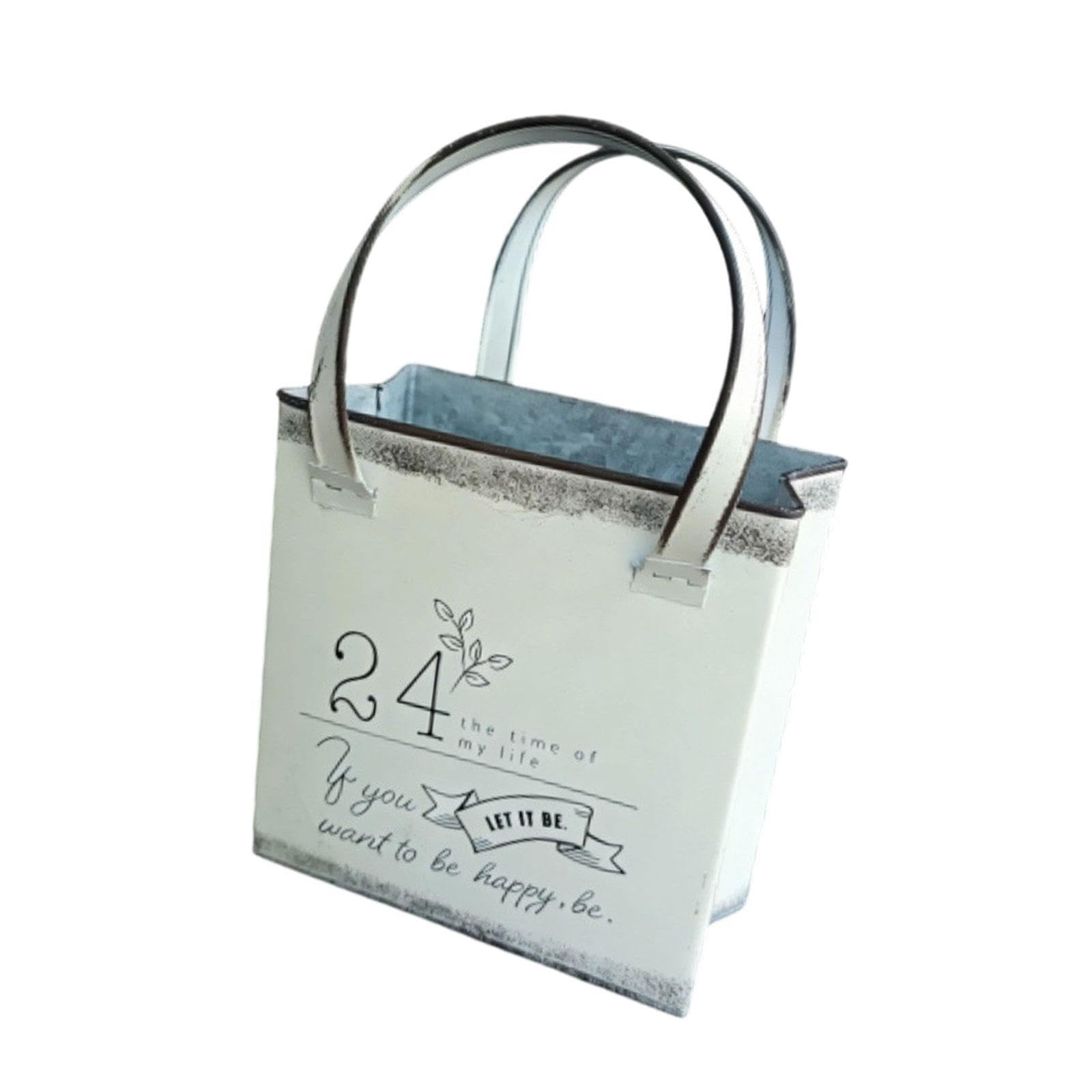 Pot de fleurs sac à main blanc idéal pour décorer une pelouse ou un grand événement