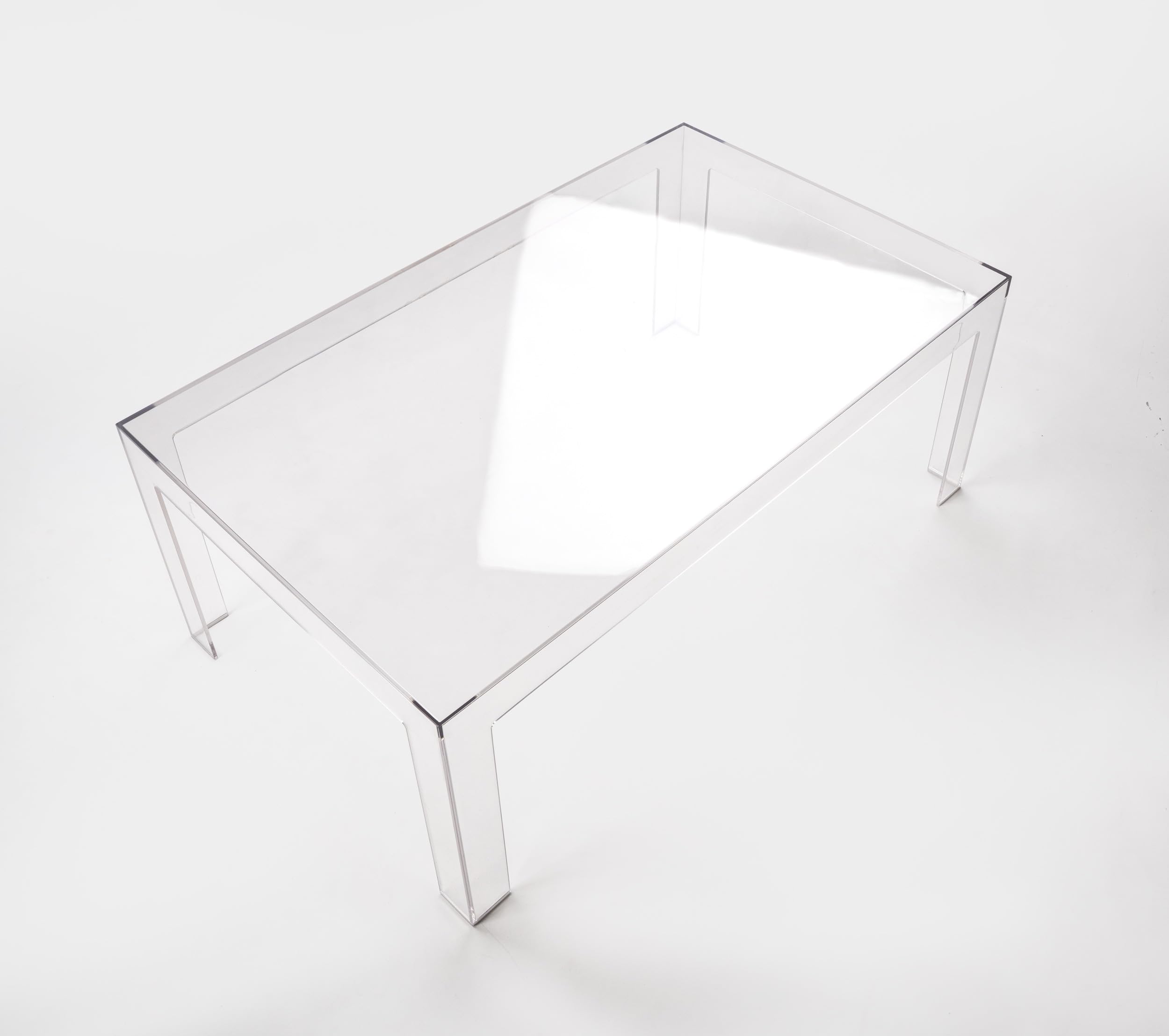 Tavolino da salotto trasparente in policarbonato monoblocco, design moderno, Made in Italy.