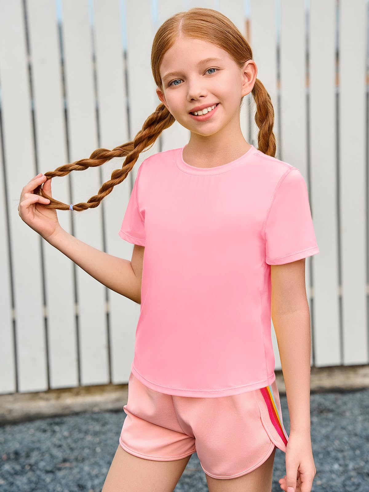 Camisetas atléticas manga corta niñas ajuste seco dobladillo curvado 5-14 años