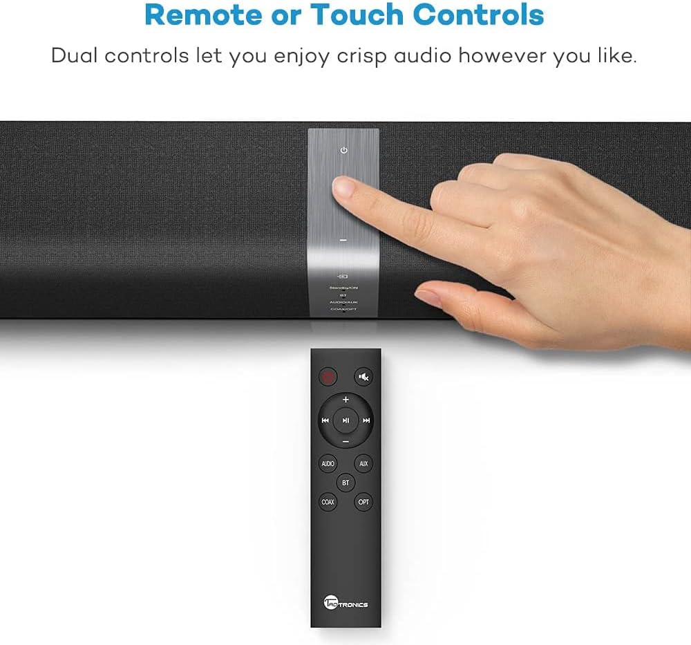 Hand touching the control panel of the TaoTronics TT-SK15 Sound Bar, with remote control below