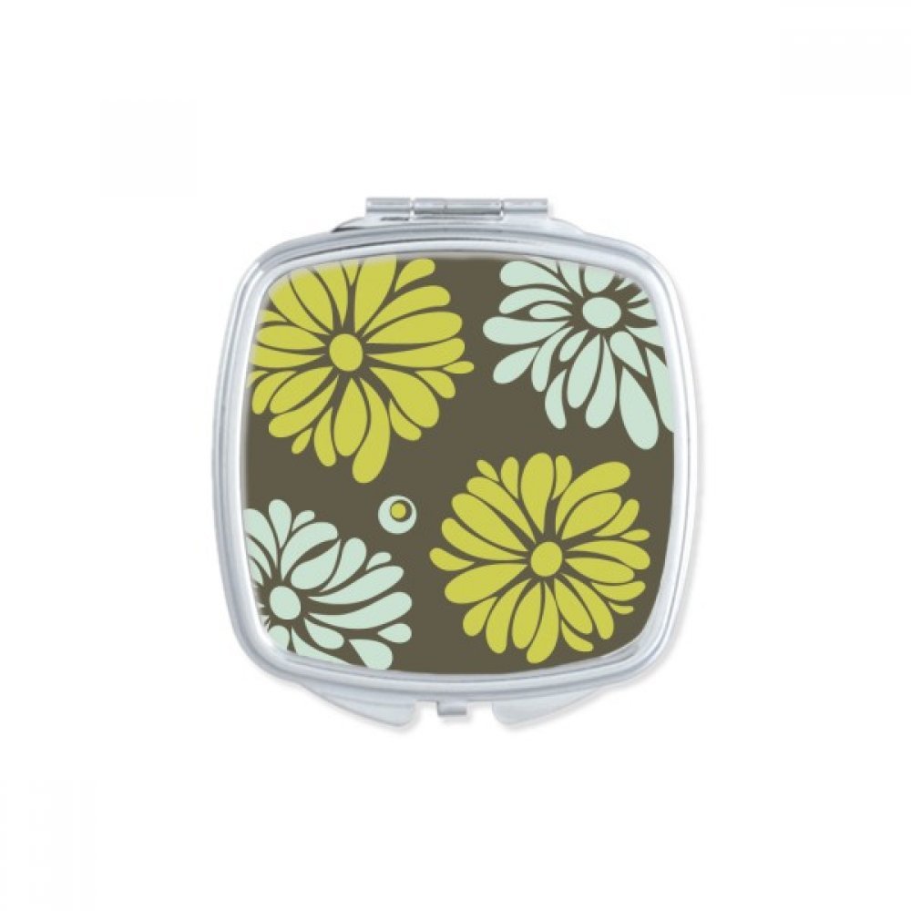 Miroir de poche chrysanthème jaune : l'accessoire compact chic