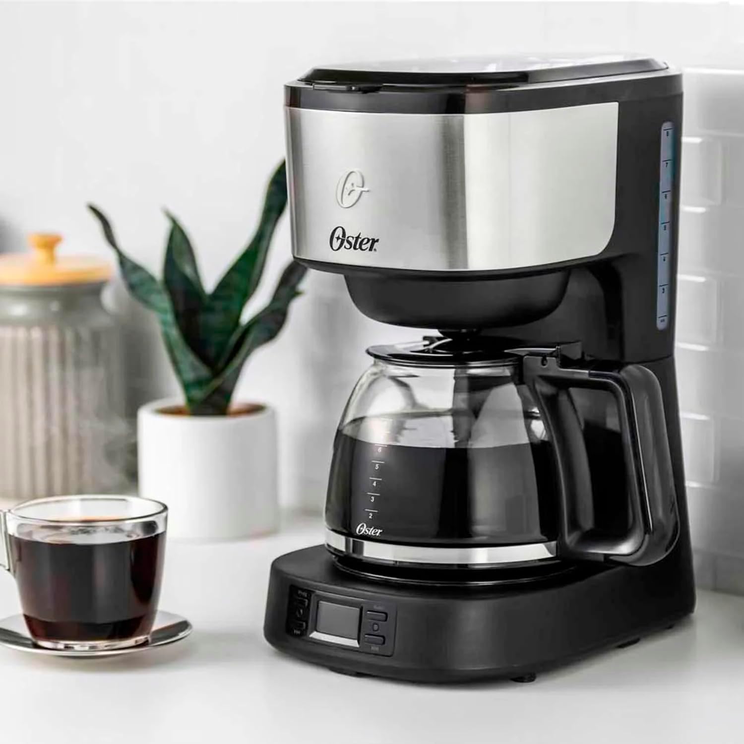 Oster 8-Cup Programmable Coffee Maker with glass carafe and control panel