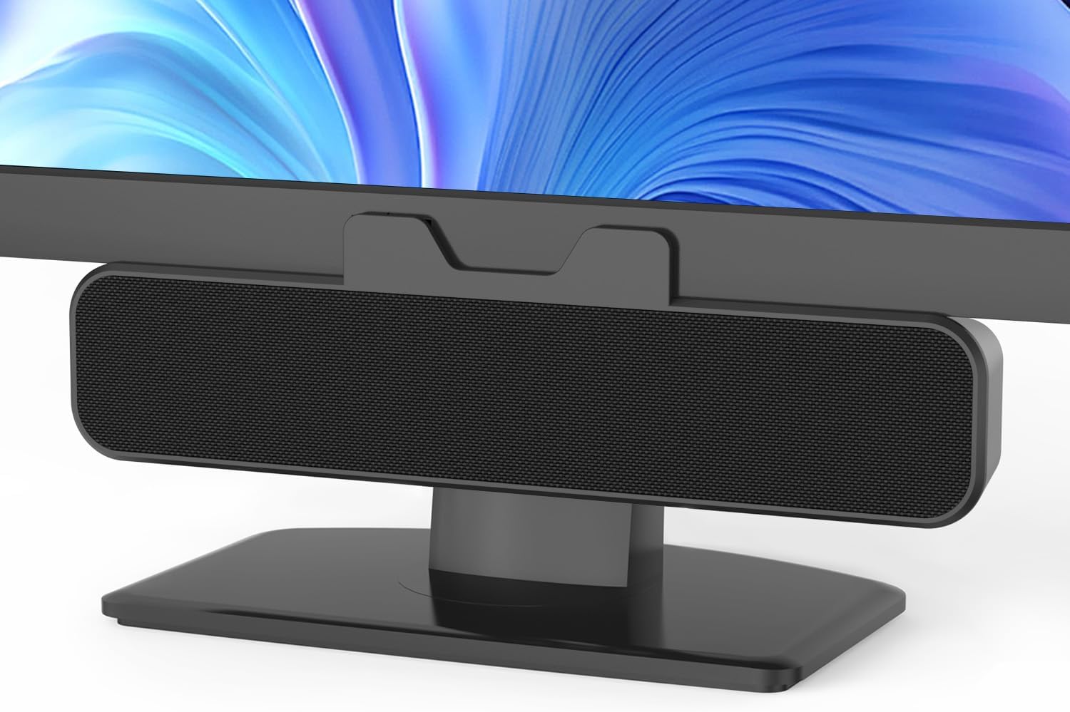 Inwa speaker securely clipped to the top of a computer monitor.