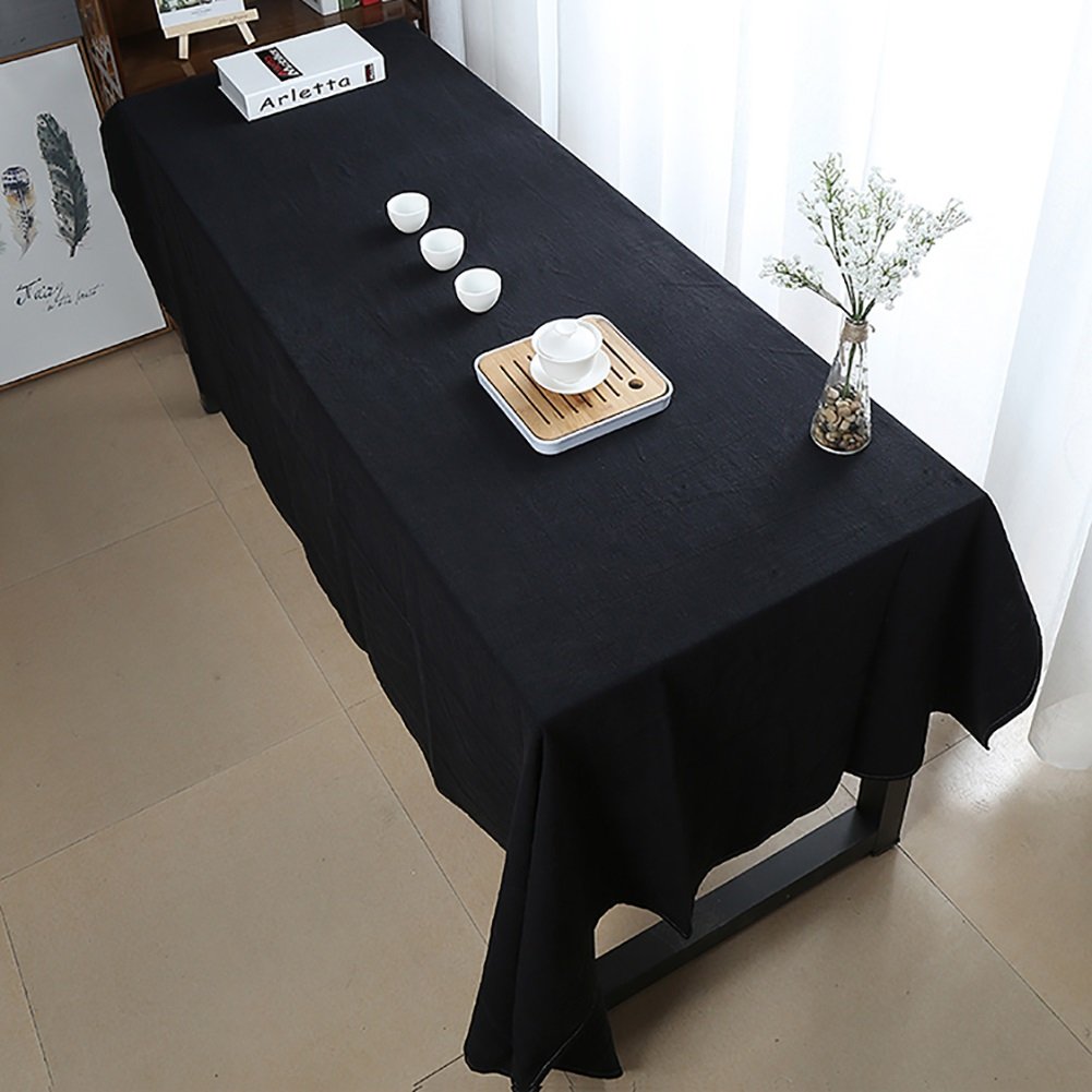 Grande nappe de banquet de couleur unie au drapé fluide et finitions soignées