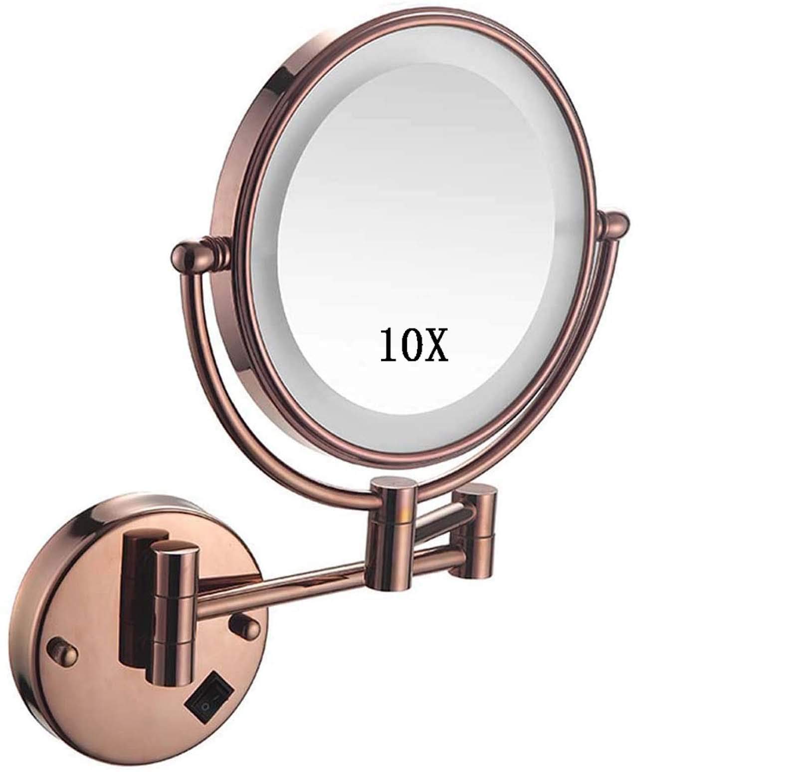 Miroir grossissant double face mural rond en finition rose gold