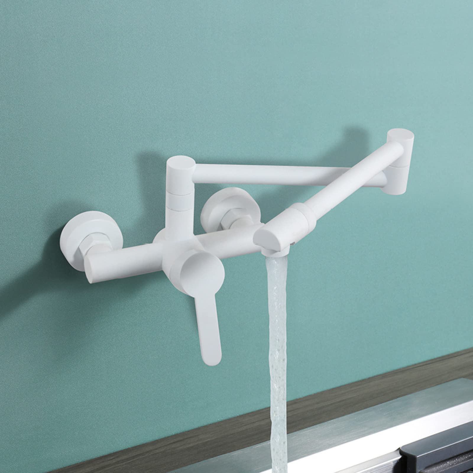 Robinets mélangeurs pliables muraux pour simplifier la vaisselle