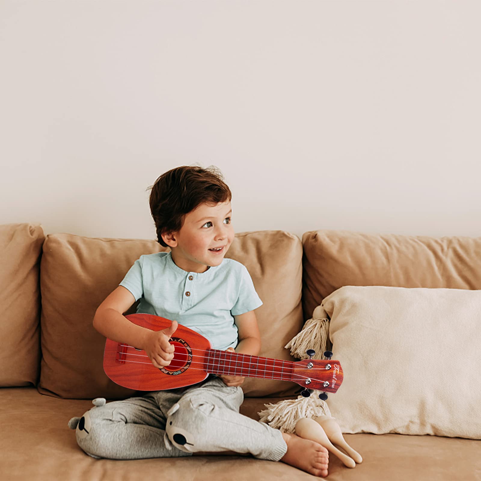 Ukelele pour enfants, guitare pour enfants, mini ukulélé acoustique de 43 cm, kit pour débutants avec médiator et sangle– Idéal pour les tout-petits et les débutants (marron foncé)