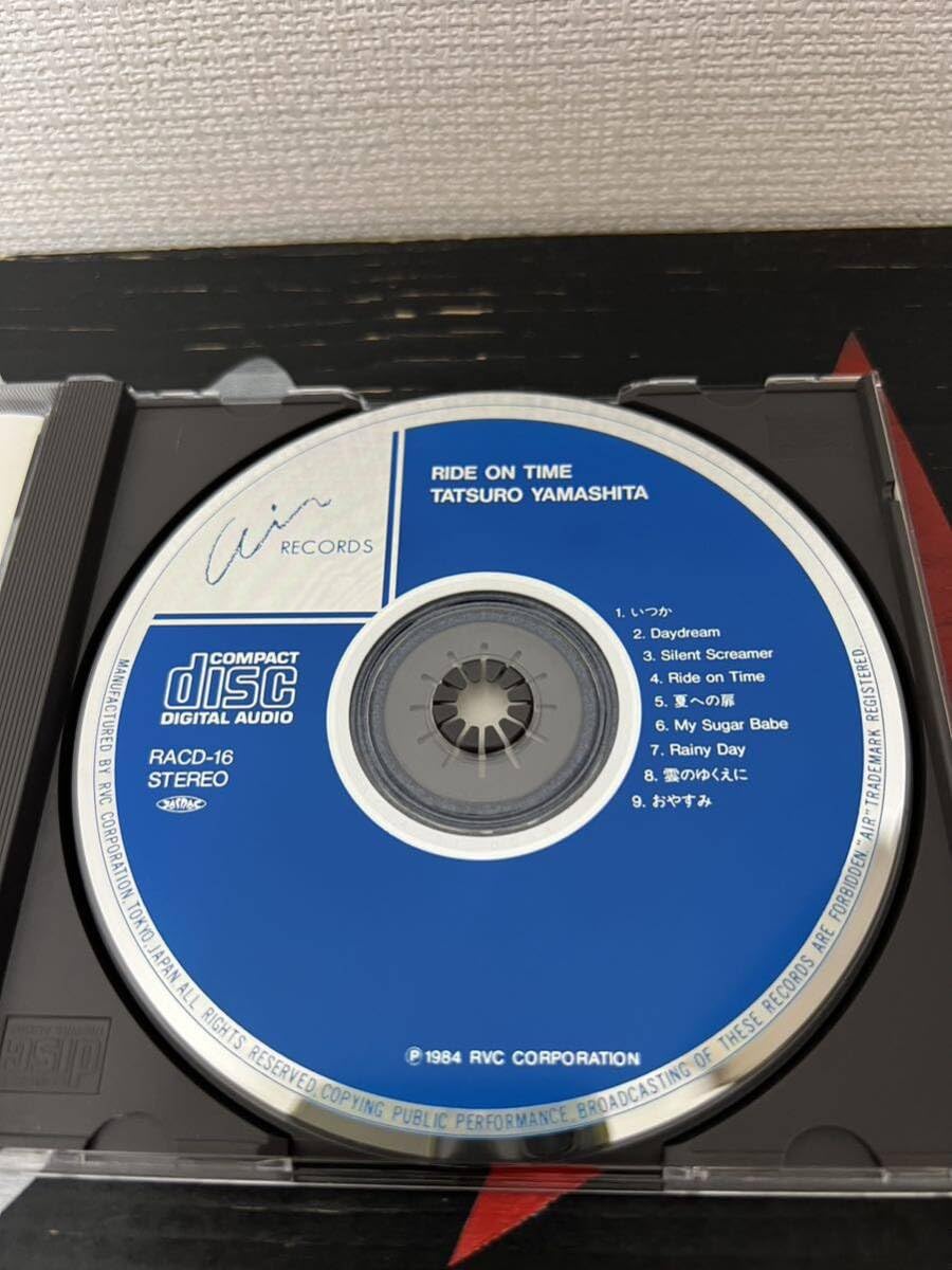 Amazon.co.jp: 盤面旧規格CD RACD 国内初回盤3800円山下達郎 ride on