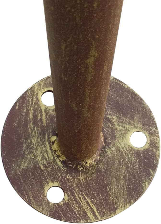 Close-up of a pergola base plate with anchor holes