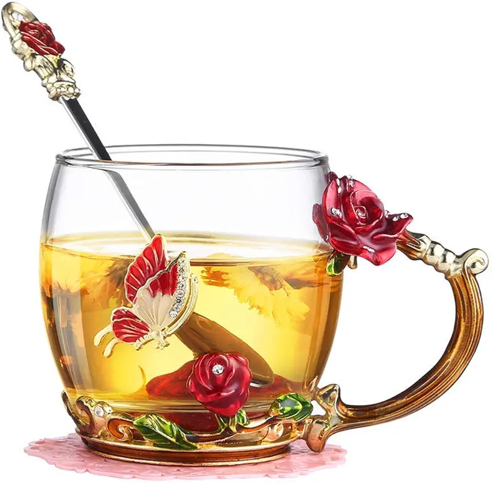 Glasmugg med fjäril och blomma i emalj