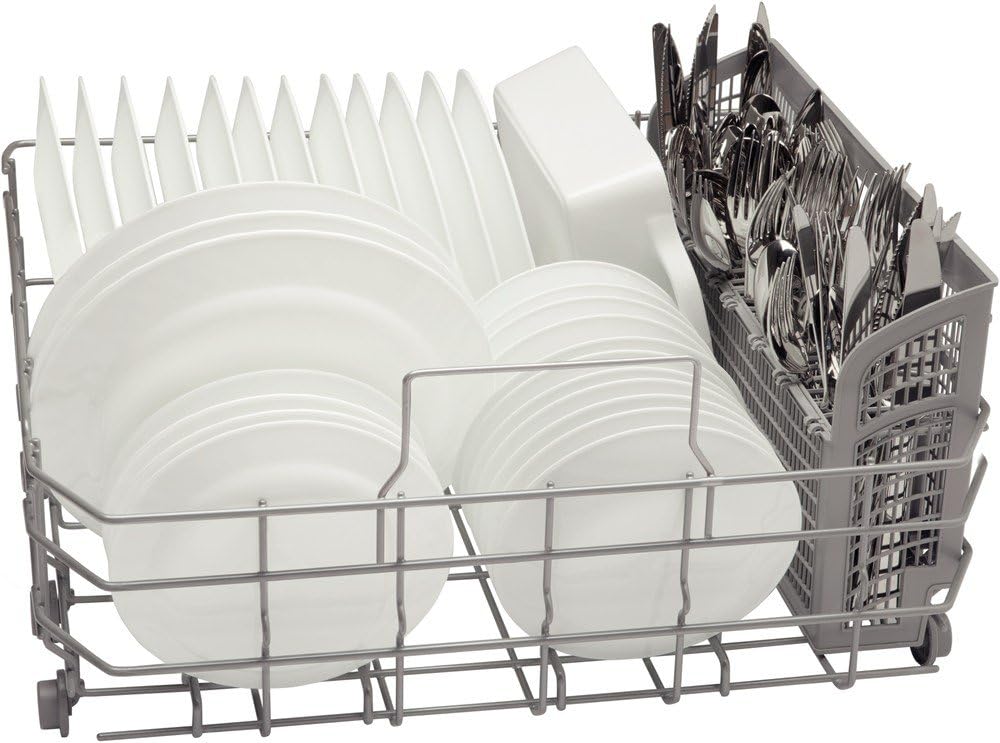 Close-up of lower rack with plates and cutlery basket