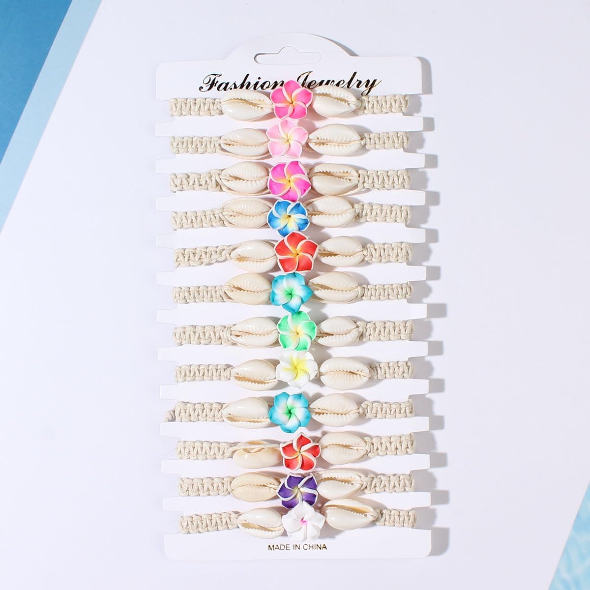 COLORFUL BLING 5 to 12 Pcs Hawaiian Plumeria Rubra Bracelets for Women Bohemian Shell Starfish Tropical Flower Charms Bracelet Set Handmade Braided Woven Rope Stretch Bracelets Summer Beach Jewelry - Image 4