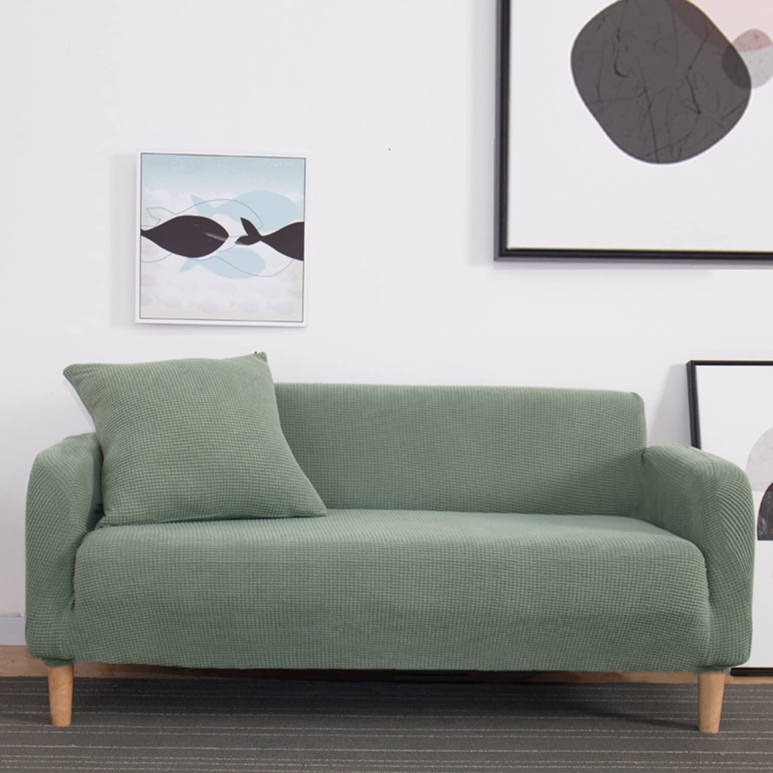 Housse de canape extensible verte pour rafraichir votre salon