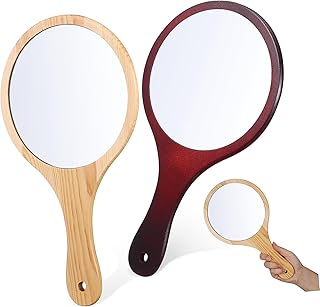 Espejo de mano fino de vidrio con mango de ma...