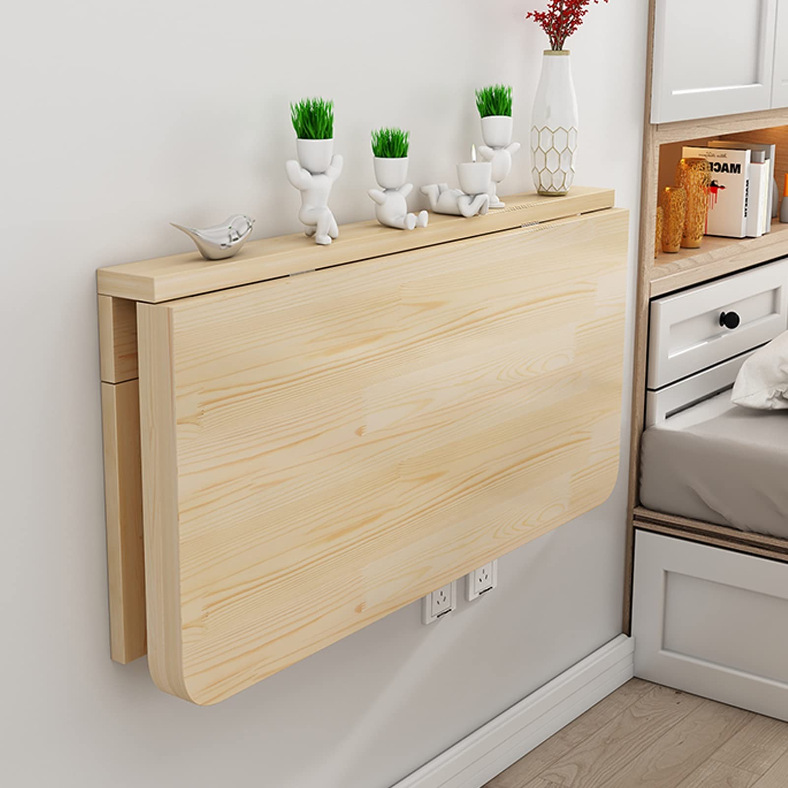 Table pliante bois massif pour meubler un petit espace sans encombrer le sol