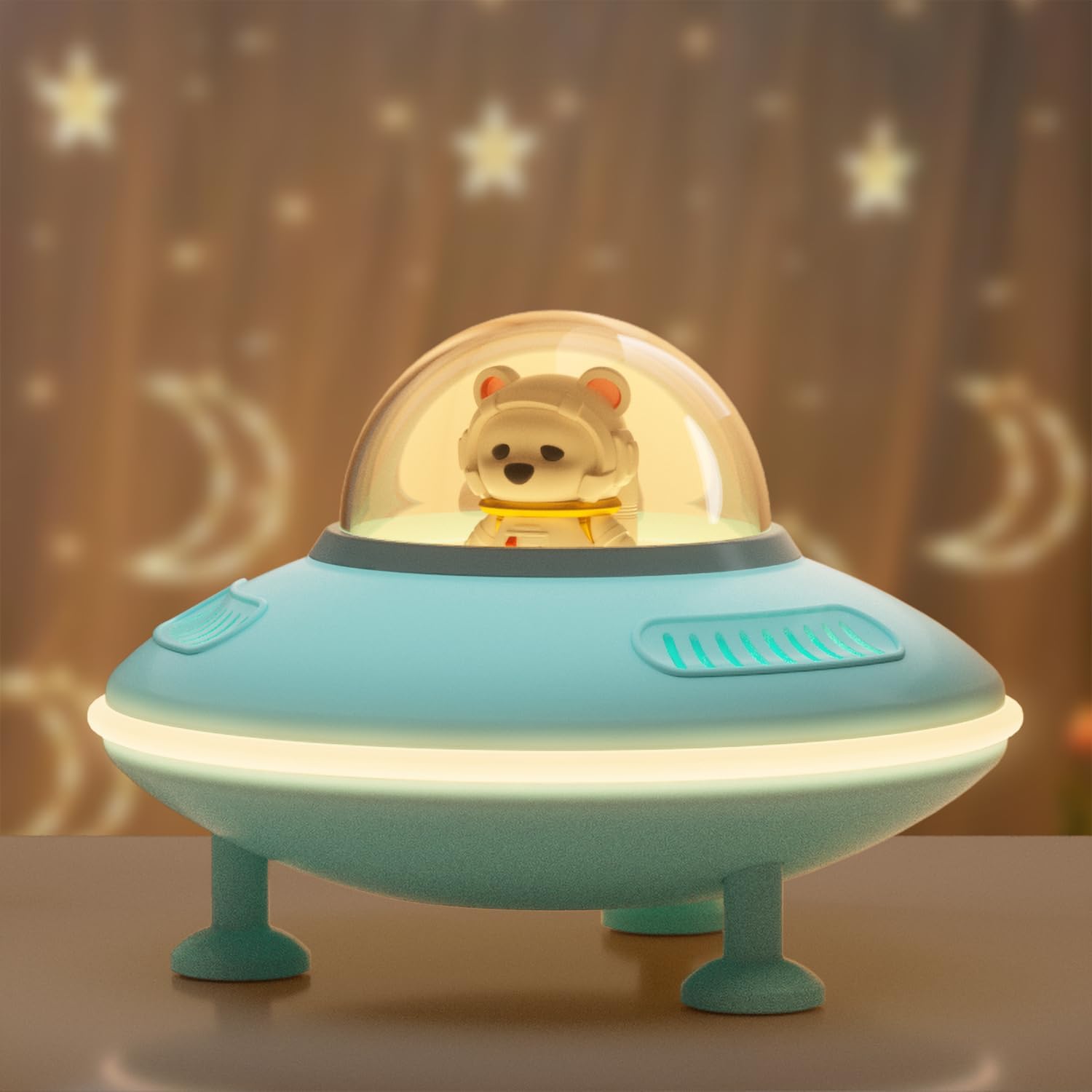 Baolira Mini Bluetooth Speaker, Blue color, spaceship design with an astronaut bear inside a clear dome, emitting a warm glow.