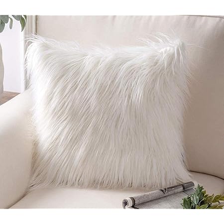 small white fluffy cushion