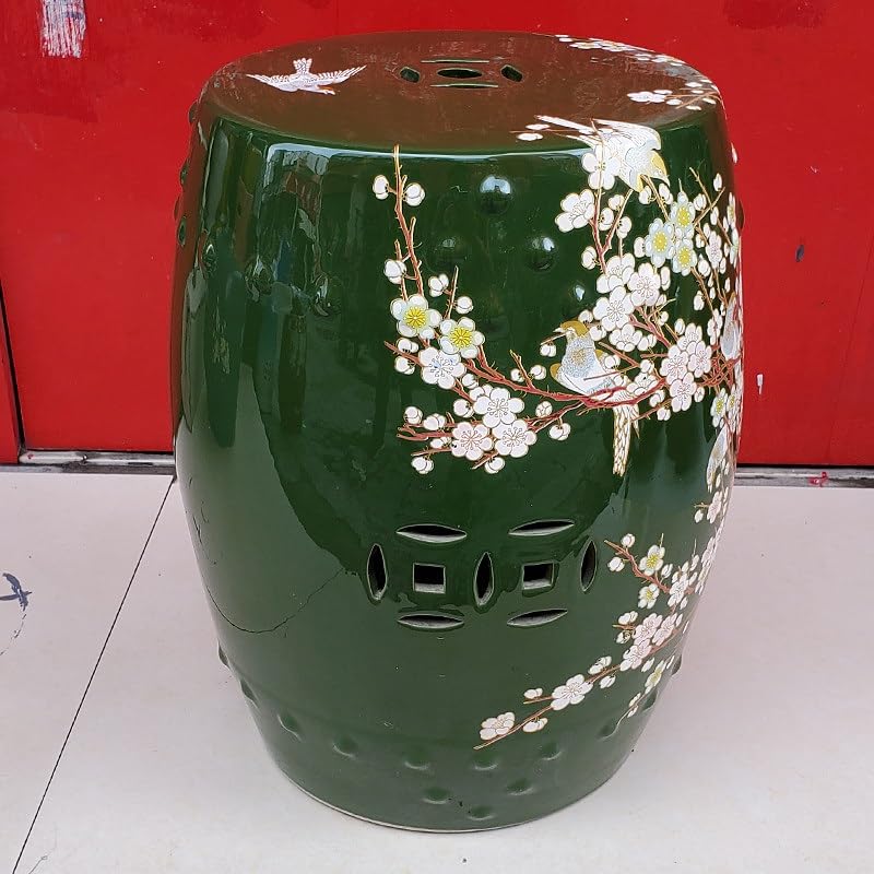 Mesa auxiliar para exteriores y soporte para plantas en este taburete de cerámica