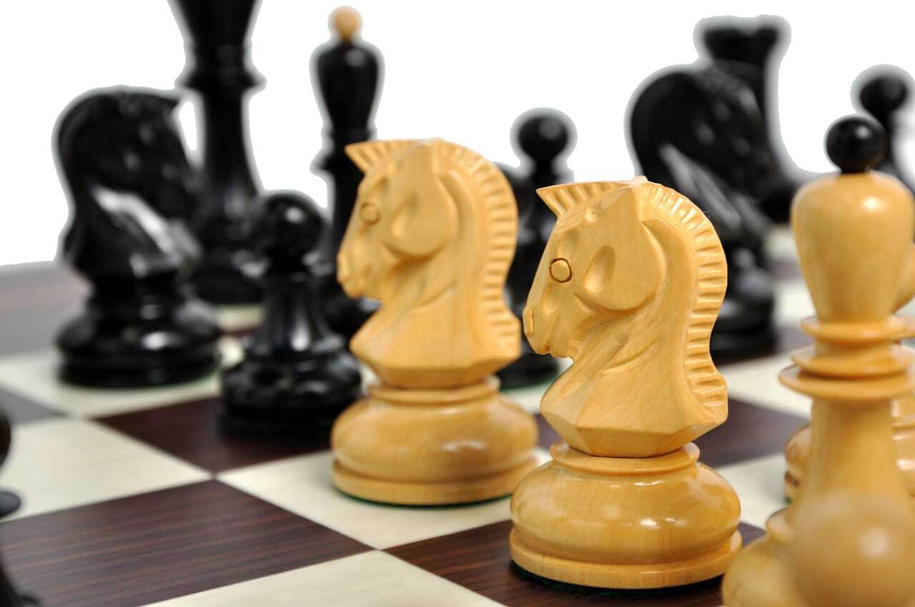 The Dubrovnik Chess Set, Box, Board Combination - Ebonized Boxwood and Natural Boxwood - by The House of Staunton