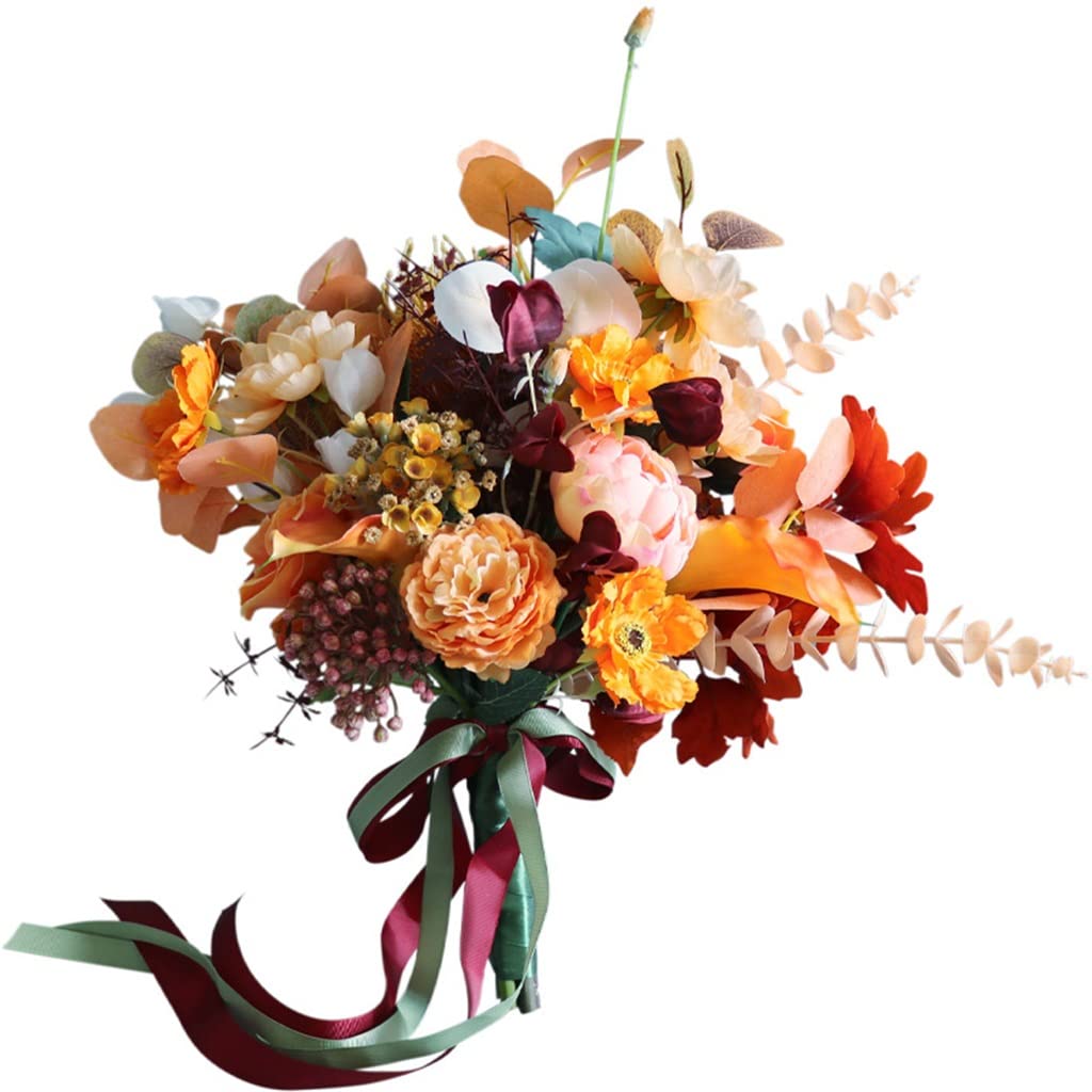 Bouquet de main de mariée vintage automne contre fleurs fanées mariage