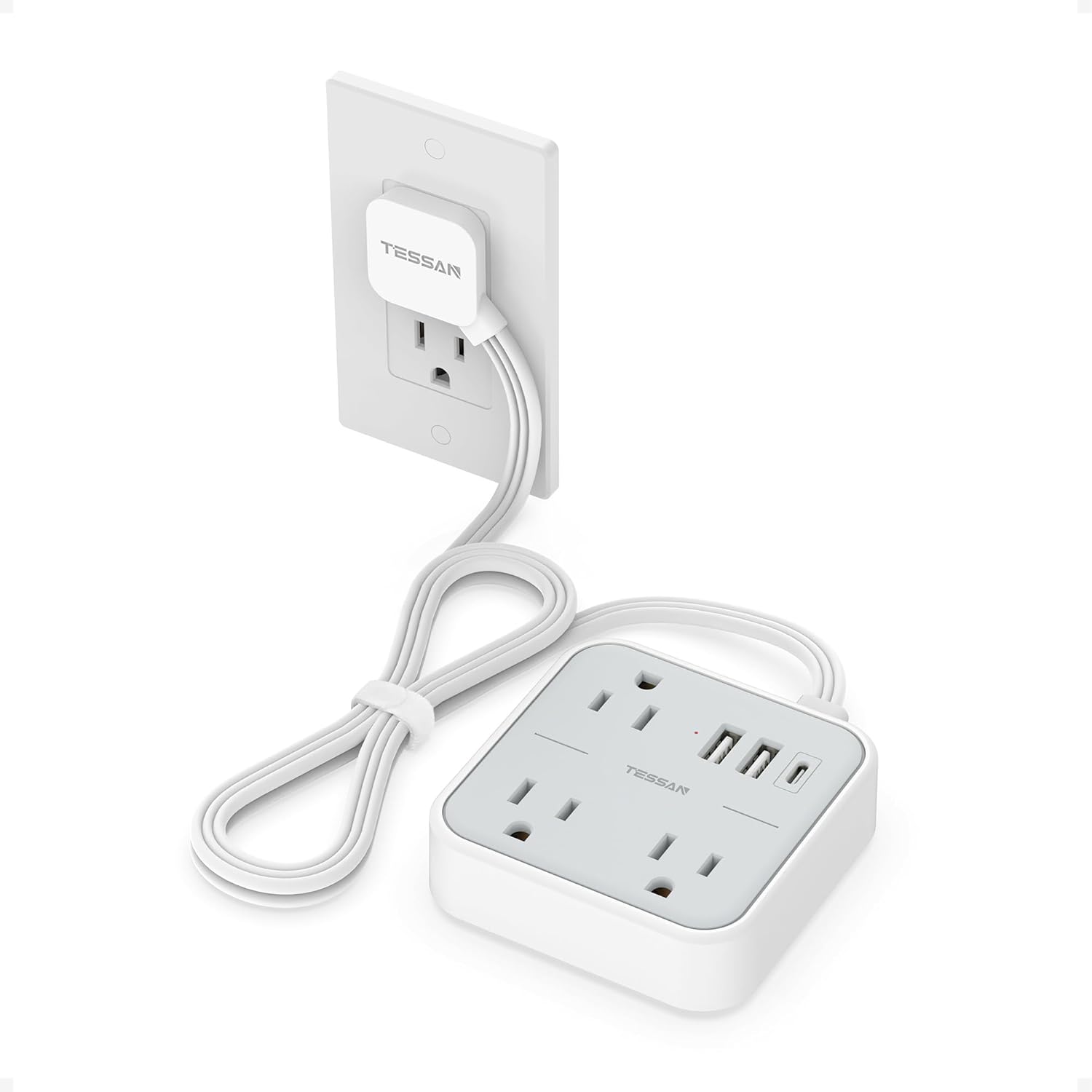 TESSAN power strip plugged into a wall outlet