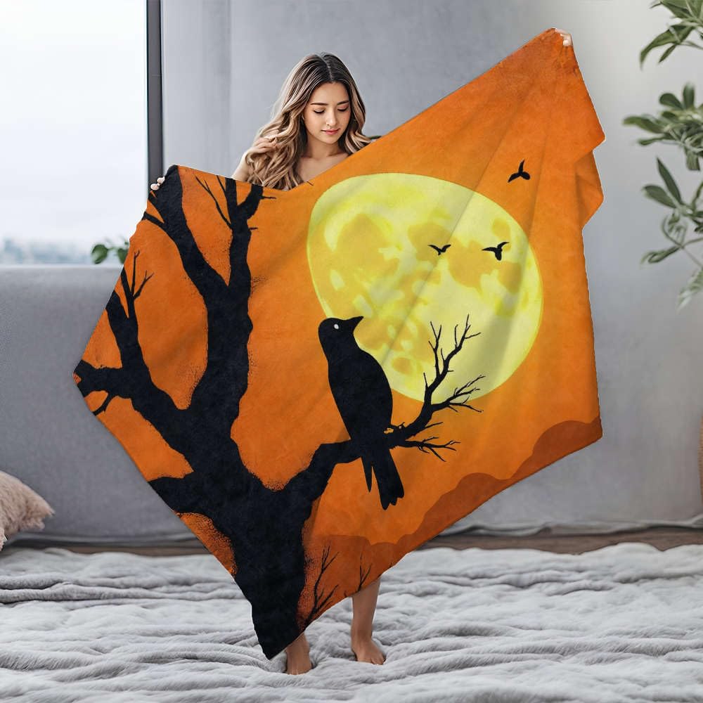 Couverture corbeau lune en flanelle pour vos soirées canapé