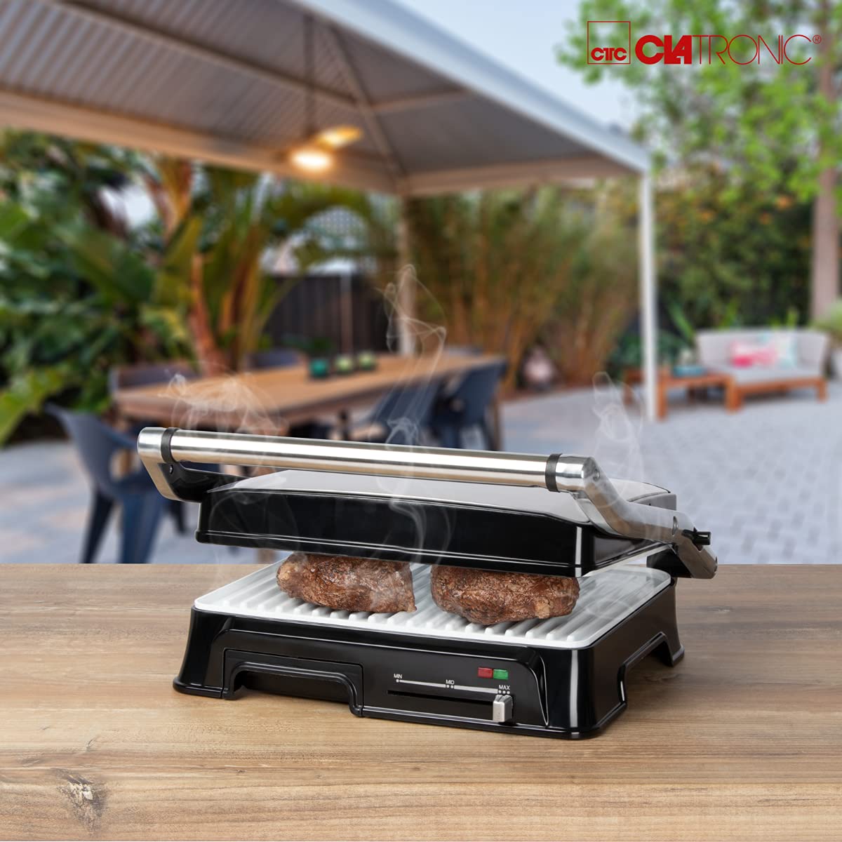 Clatronic KG 3571 grill kontaktowy do dwustronnego grillowania, 2000 W, obudowa ze stali nierdzewnej, krótkie czasy gotowania, rynna odpływowa tłuszczowa i tacka zbierająca, kolor srebrny