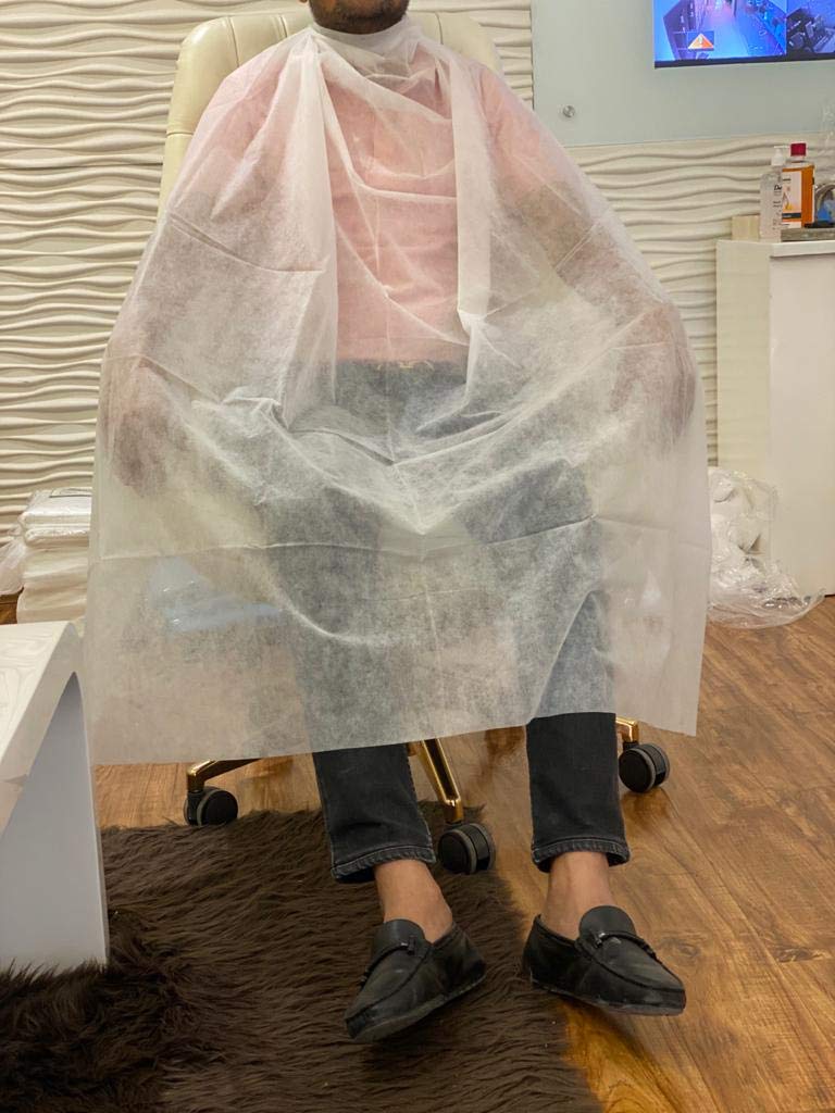 Adaamya� Non Woven Disposable Apron for Salon and Spa (White) -1 Packet - 10 Pieces