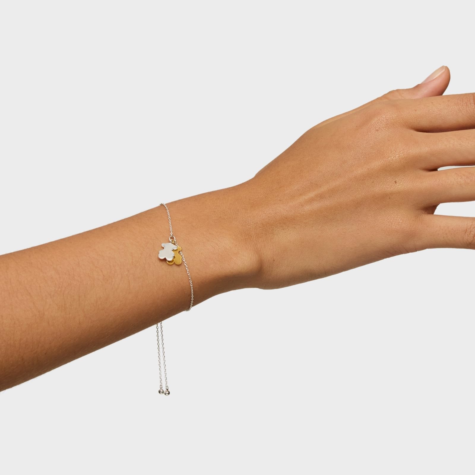 TOUS Pulsera de Plata de Primera Ley para Mujer con Doble Oso de 10mm en Plata y Baño en Oro y Cierre Deslizante, Colección Sweet Dolls