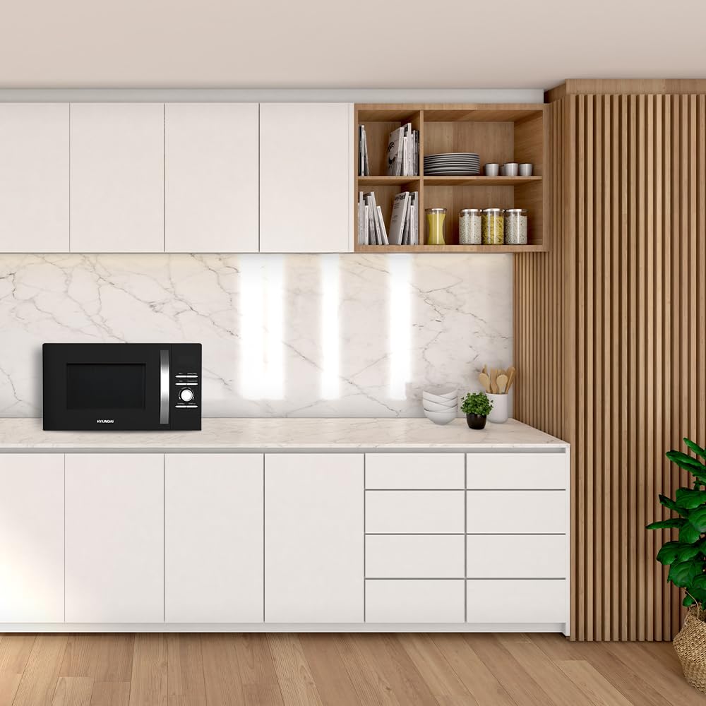 Hyundai Micro-ondes, 28 l, convection, noir, HMWAF28900GN, 900 W, 8 programmes, fonction décongélation, revêtement intérieur, nettoyage facile, minuterie 60 minutes.