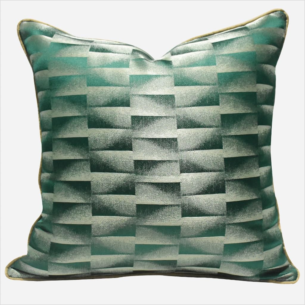 Coussin géométrique vert pour transformer l'ambiance de votre chambre à coucher