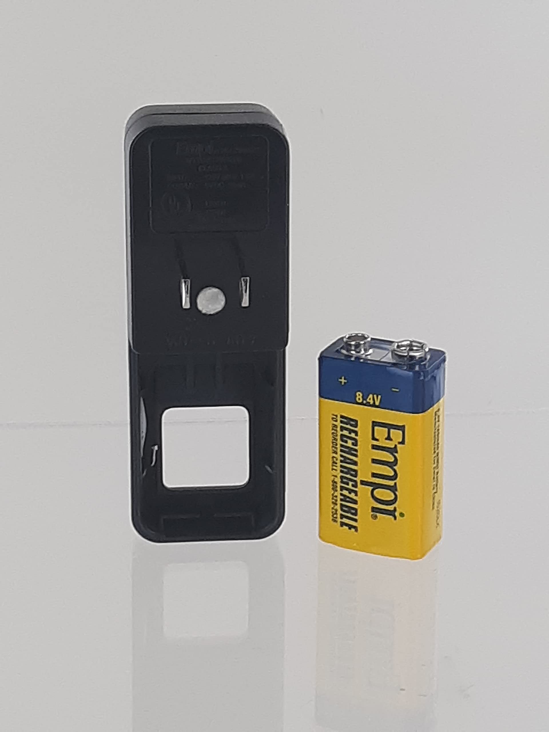 EMPI 9 Volt Charger and ONE EMPI 8.4 Volt Battery