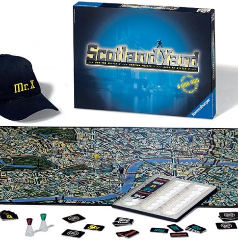 Player setting up game pieces on the Scotland Yard board