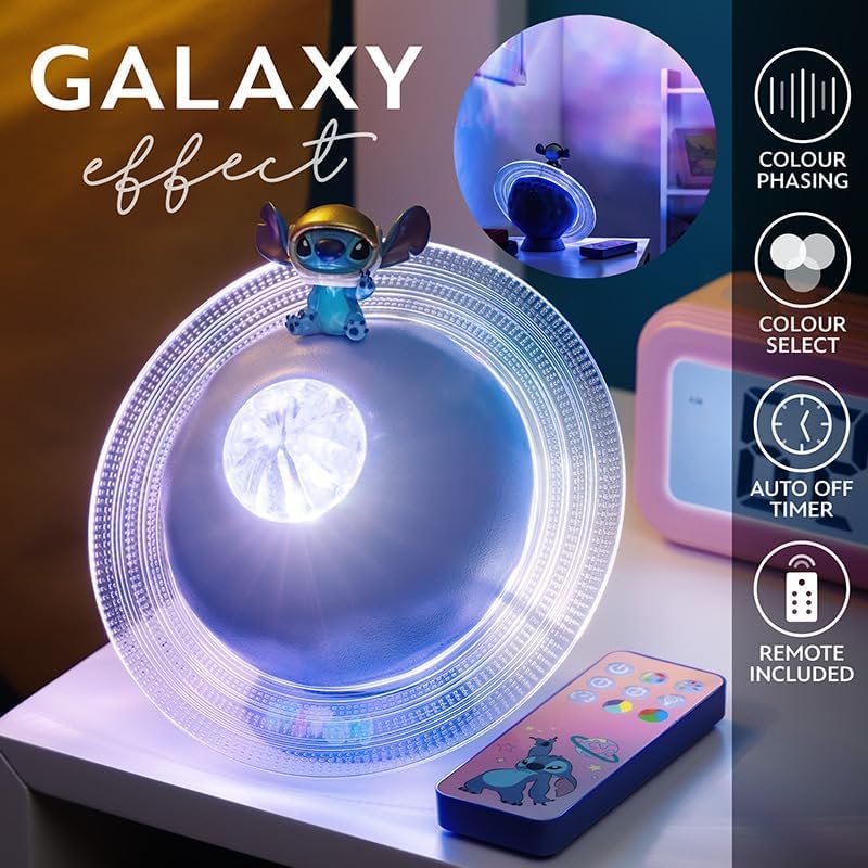 Paladone Lilo & Stitch Galaxy Projection Light displaying a galaxy effect with the remote control nearby.