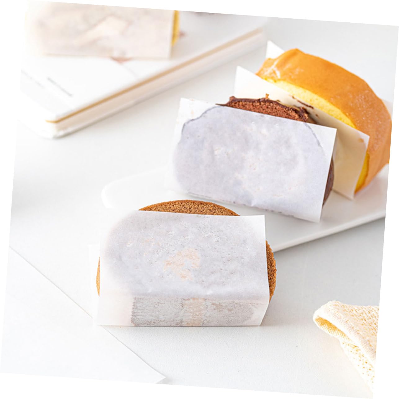 GRIRIW 100 Sheets Swiss Roll Paper Food Packaging Paper for Cake Sandwich Cookies