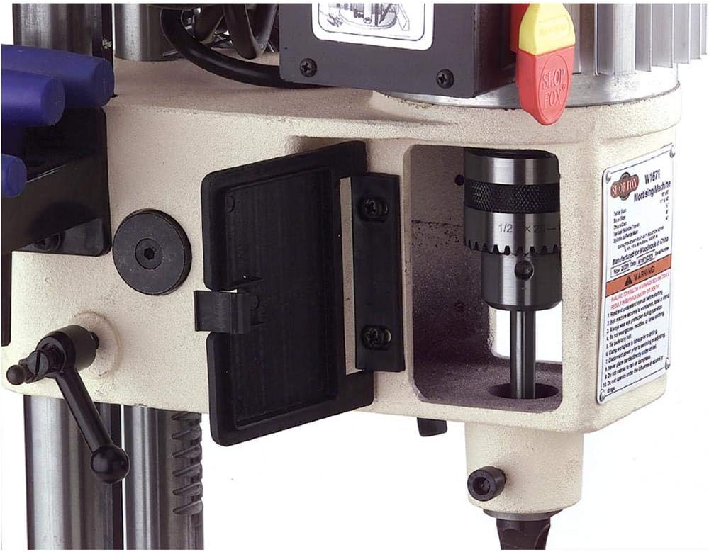 Close-up of the Shop Fox W1671 chuck access with a chisel and bit installed