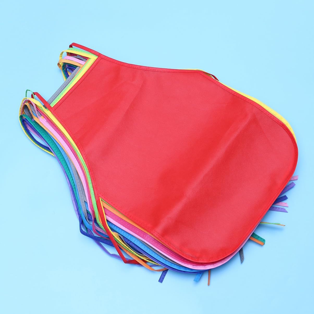 KOMBIUDA Grembiuli Non Tessuto per Pittura e Cucina Bambini Reutilizzabili Facili da Pulire 24pezzi Colore Casuale