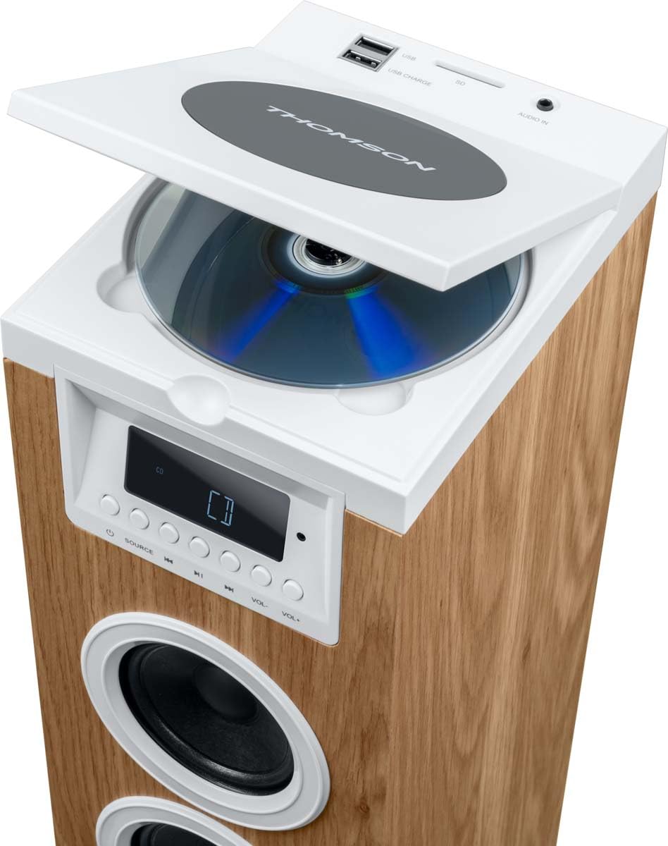 Puncak view of the Thomson Multimedia Tower with the CD player lid open, revealing a CD inside.