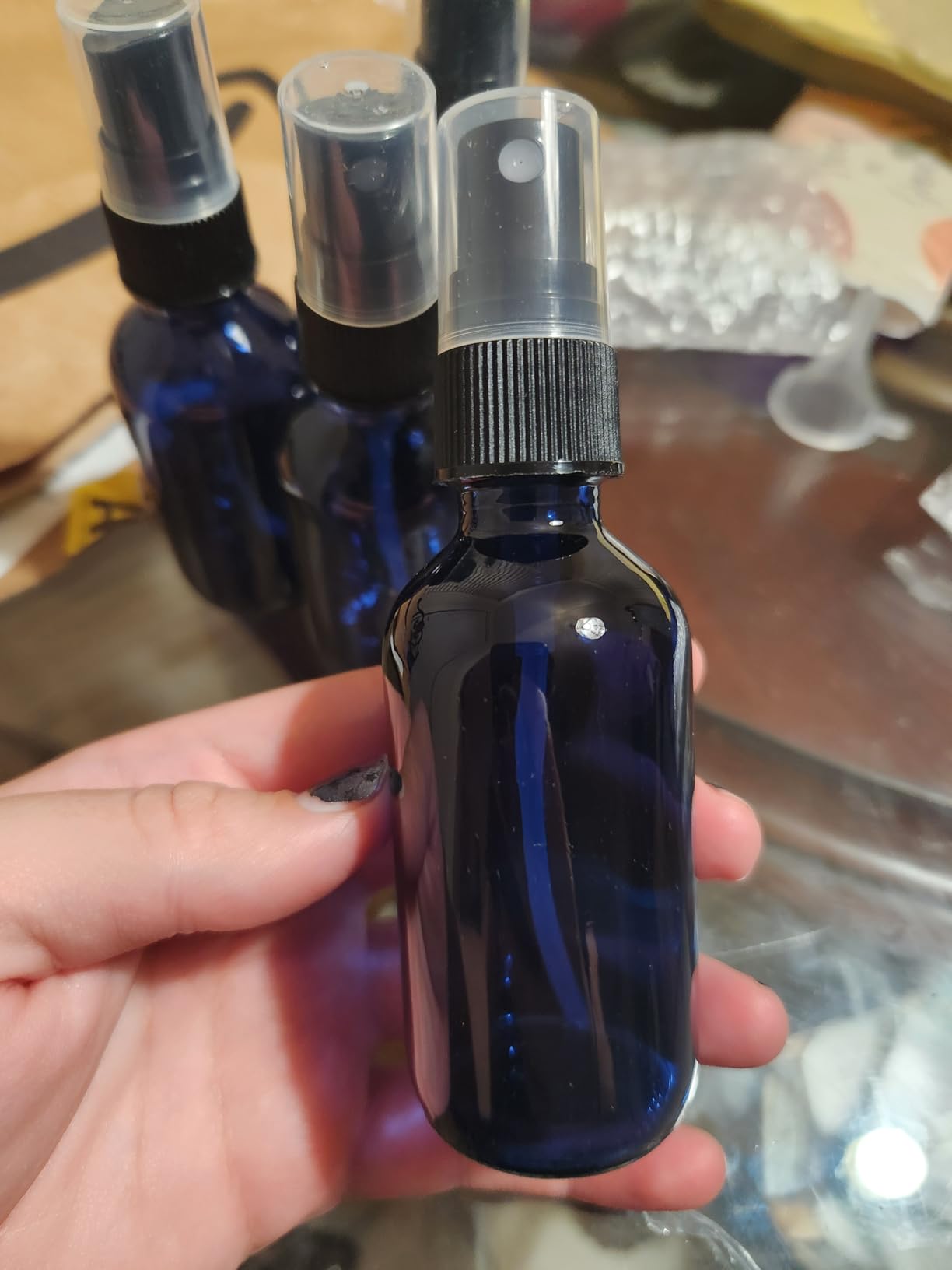 Wedama 2 oz Mini Glass Spray Bottles, Empty Small Spray Bottles with Funnel Dropper, Fine Mist for Hair, Travel, Plants, Cleaning Solutions and Skin Care (4 Pack Amber)